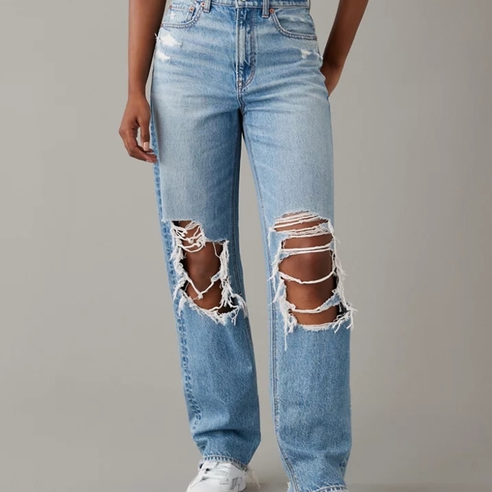 American Eagle Outfitters Distressed Light Blue Straight Leg Jeans.